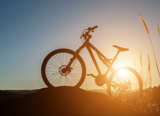 biking-leisure-black-sky-riding